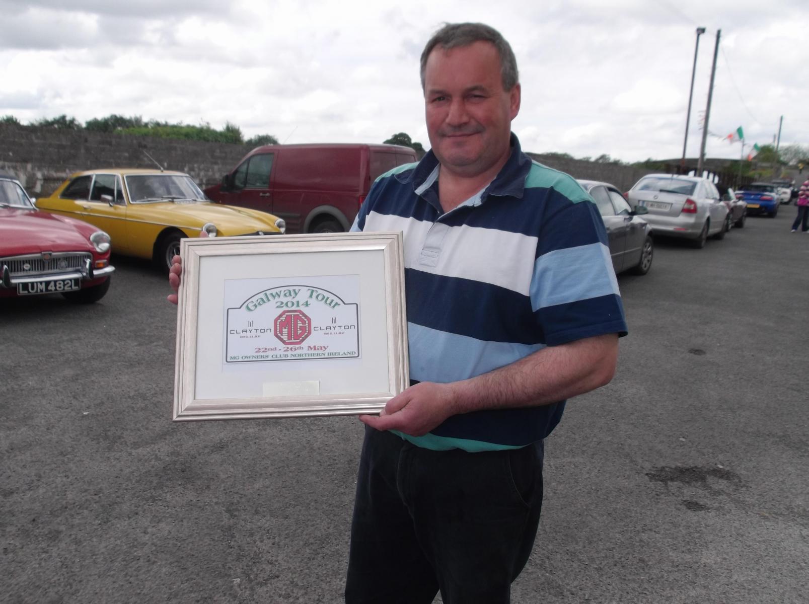 John-Moran-accepting-the-plaque-which-was-presented-to-him-at-the-Galway-weekend-sc.